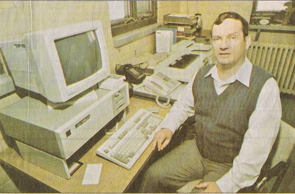 Mike Justice at his computer desk in his Wastewater Treatment Plant office